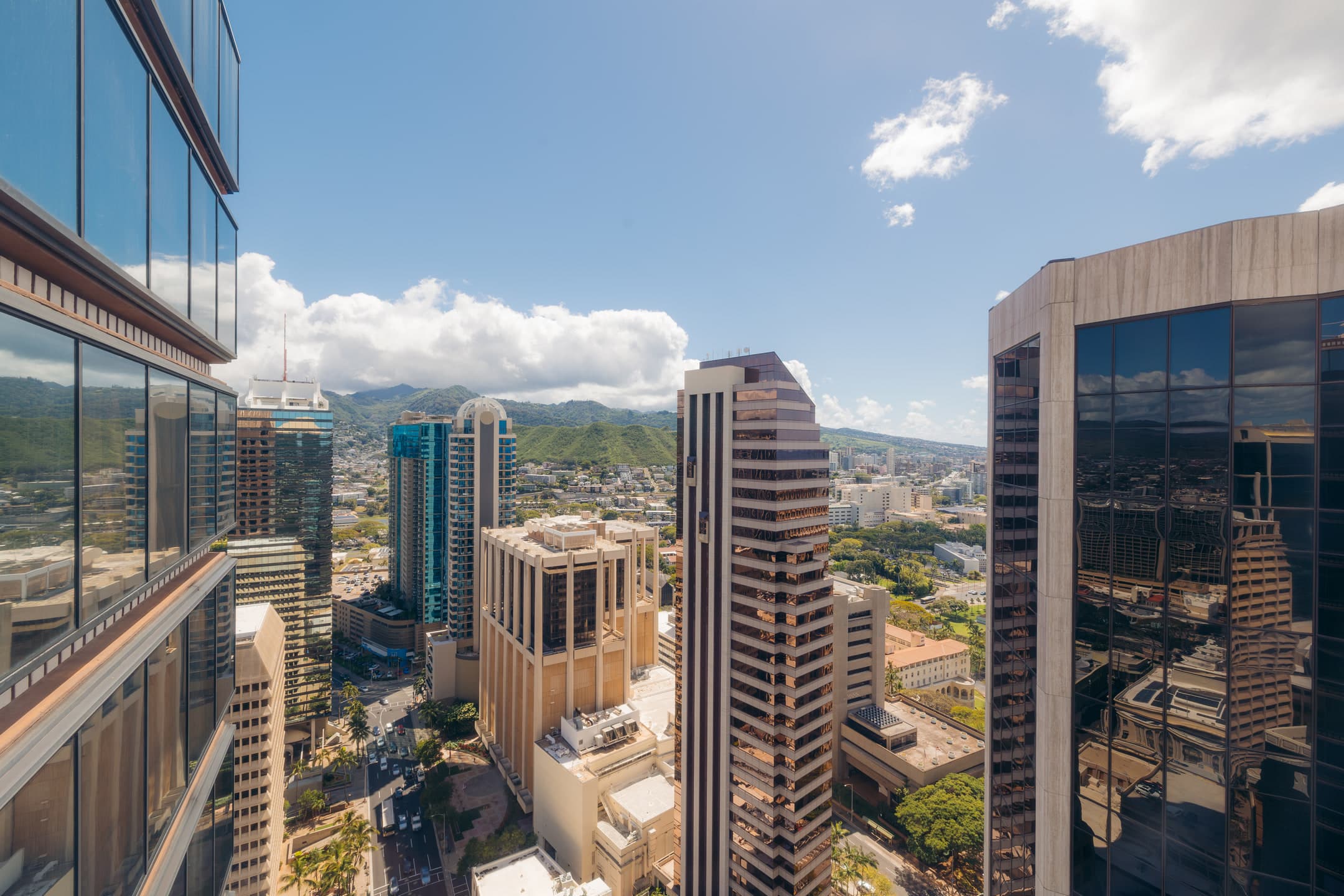 Downtown Honolulu high-rises with the Koʻolau range beyond