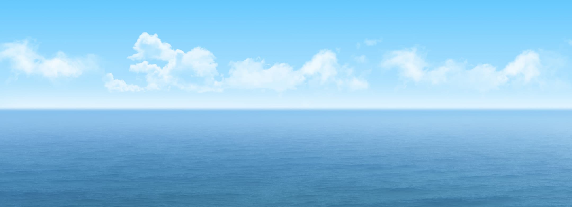 Calm open ocean under a blue sky with scattered clouds