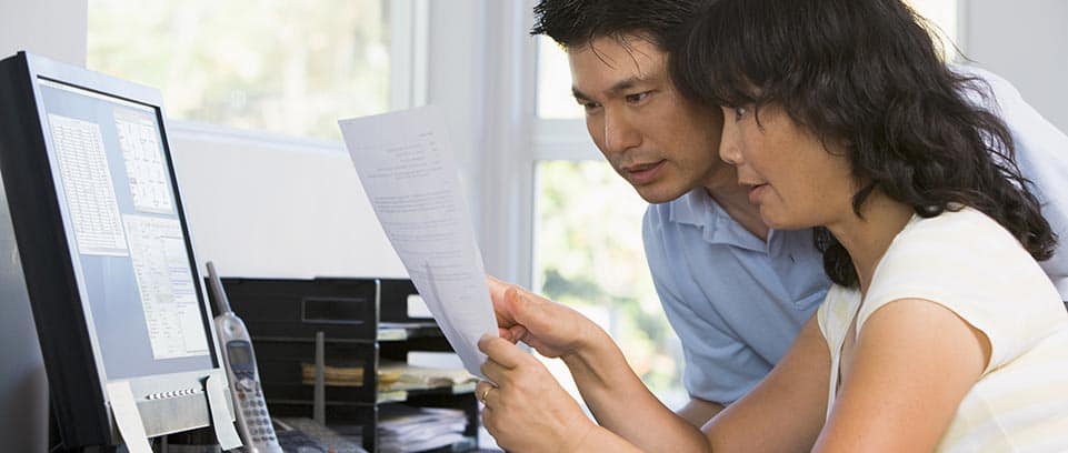 Castle owners reviewing property details together