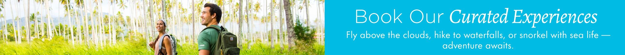 Book our curated experiences. Fly above the clouds, hike to waterfalls or snorkel with sea life -- adventure awaits.
