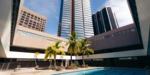 Exterior of Bishop Suites at Executive Center  and pool