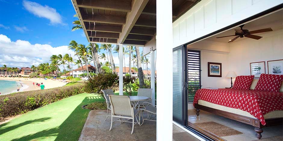 View of bedroom and beach at Kiahuna Plantation