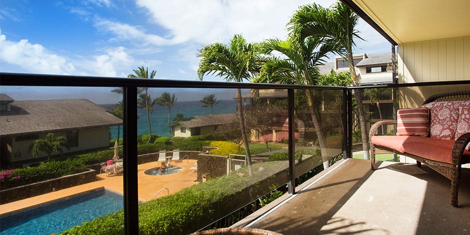 View of pool and ocean from lanai of Makahuena at Poipu