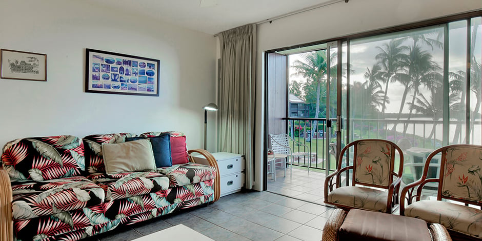 View towards lanai and palmtrees in a 1-Bedroom Oceanfront at Molokai Shores