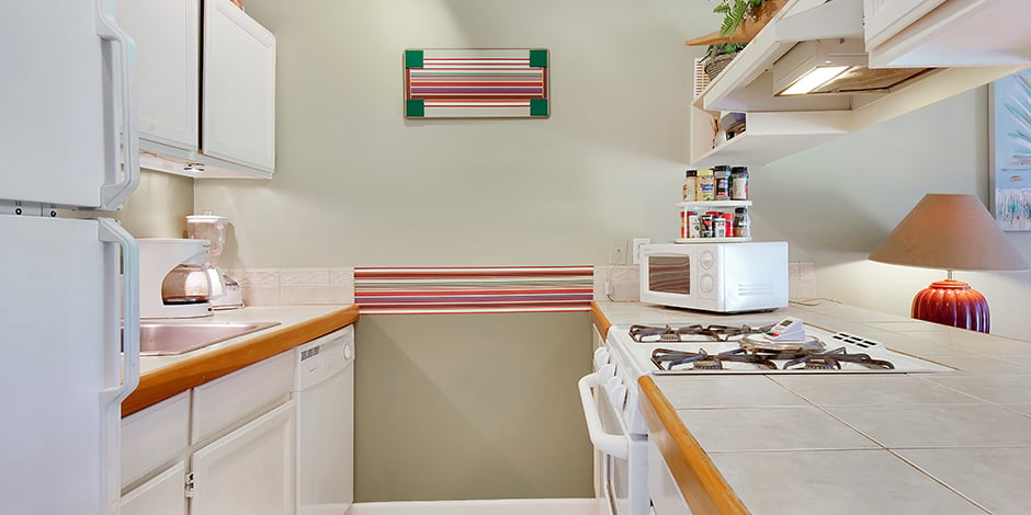 The kitchen in a 1 bedroom Ocean View at Molokai Shores