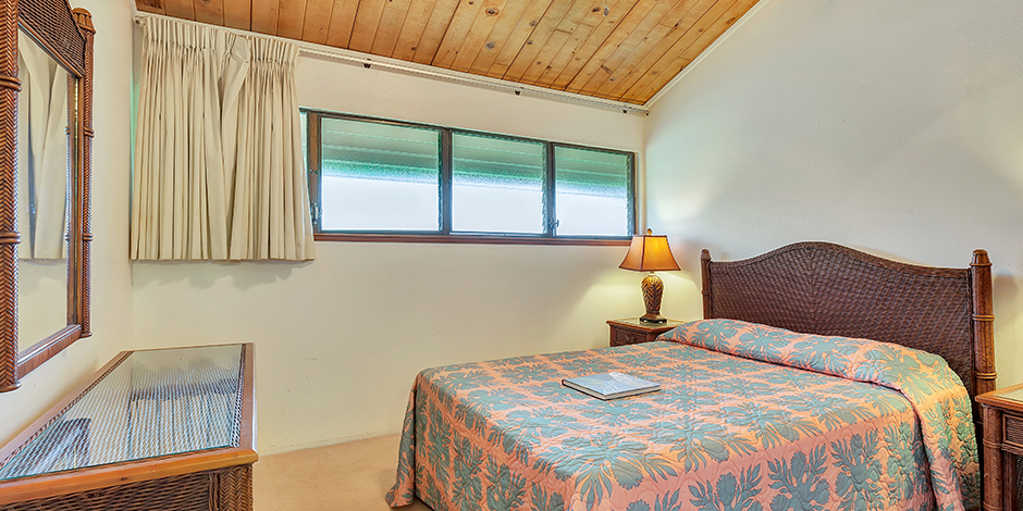 One of the bedrooms in a 2-Bedroom Ocean View at Molokai Shores